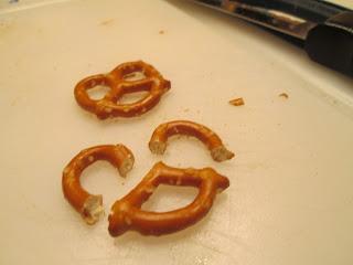 To make the handle, use the serrated knife again to cut the tops of the pretzels off.  Again, if you break a few, no worries, just eat those and move along.

