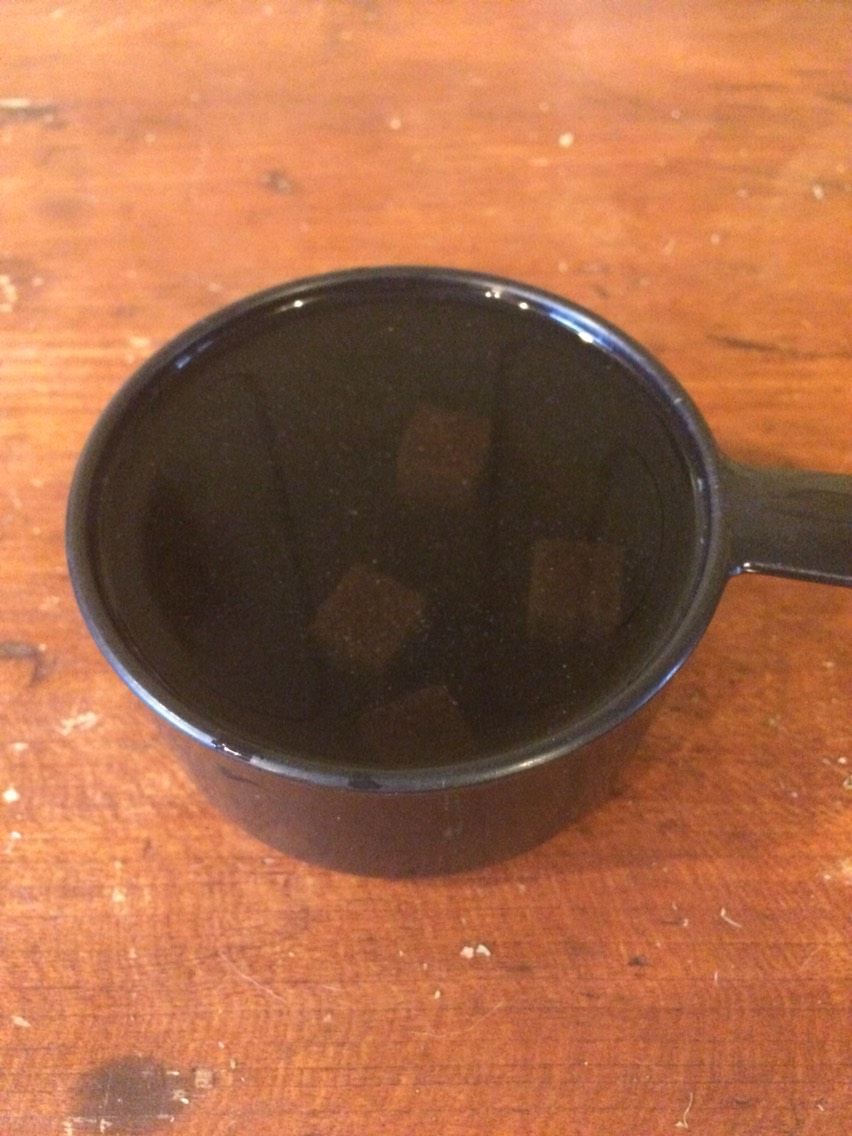 While the onions are cooking, add 5 beef bouillon cubes to 1 cup hot water. 