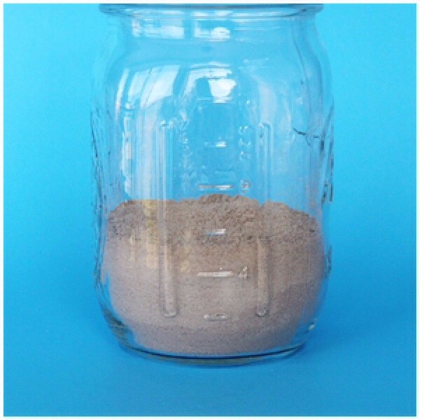 Dump the hot chocolate into the mason jar and make sure it's layered, spread out good because you will be putting more on top.
