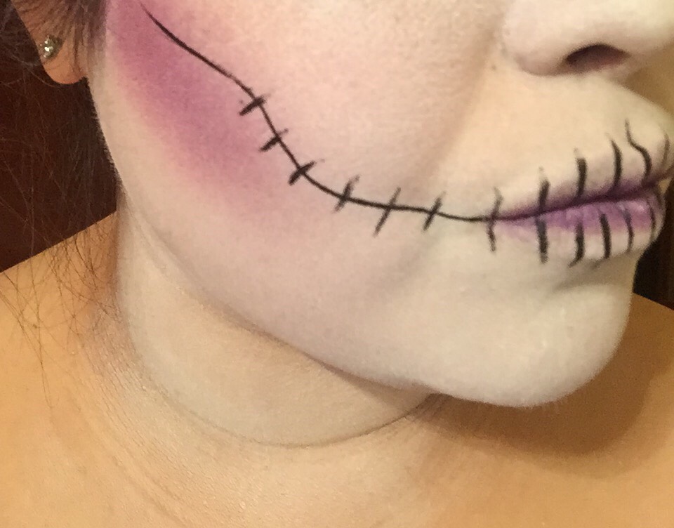 5) start your contouring as you would on any normal day! Again, choose any color you like 
6)draw a line from each corner of your mouth, you choose how far up to go. 
7)start filling in your stitches!!
8)take a brush with color and lightly run it on the inner portion of your lips