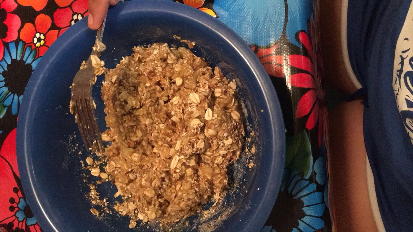 Then you will Add 1 cup of Quick oats to the banana's and mix well.