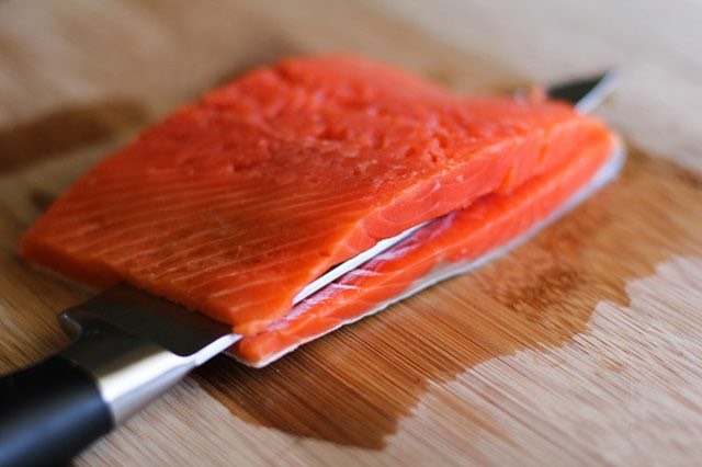 Step 7. Prepare the Salmon

Place salmon fillets (or fillet) on a cutting board. Use a sharp knife to carefully slice the salmon through the center, just until the knife almost reaches the other side.