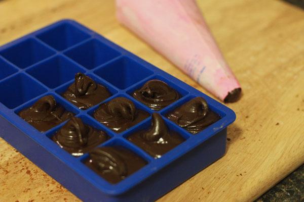 pipe the chocolate in to an icecube tray.
