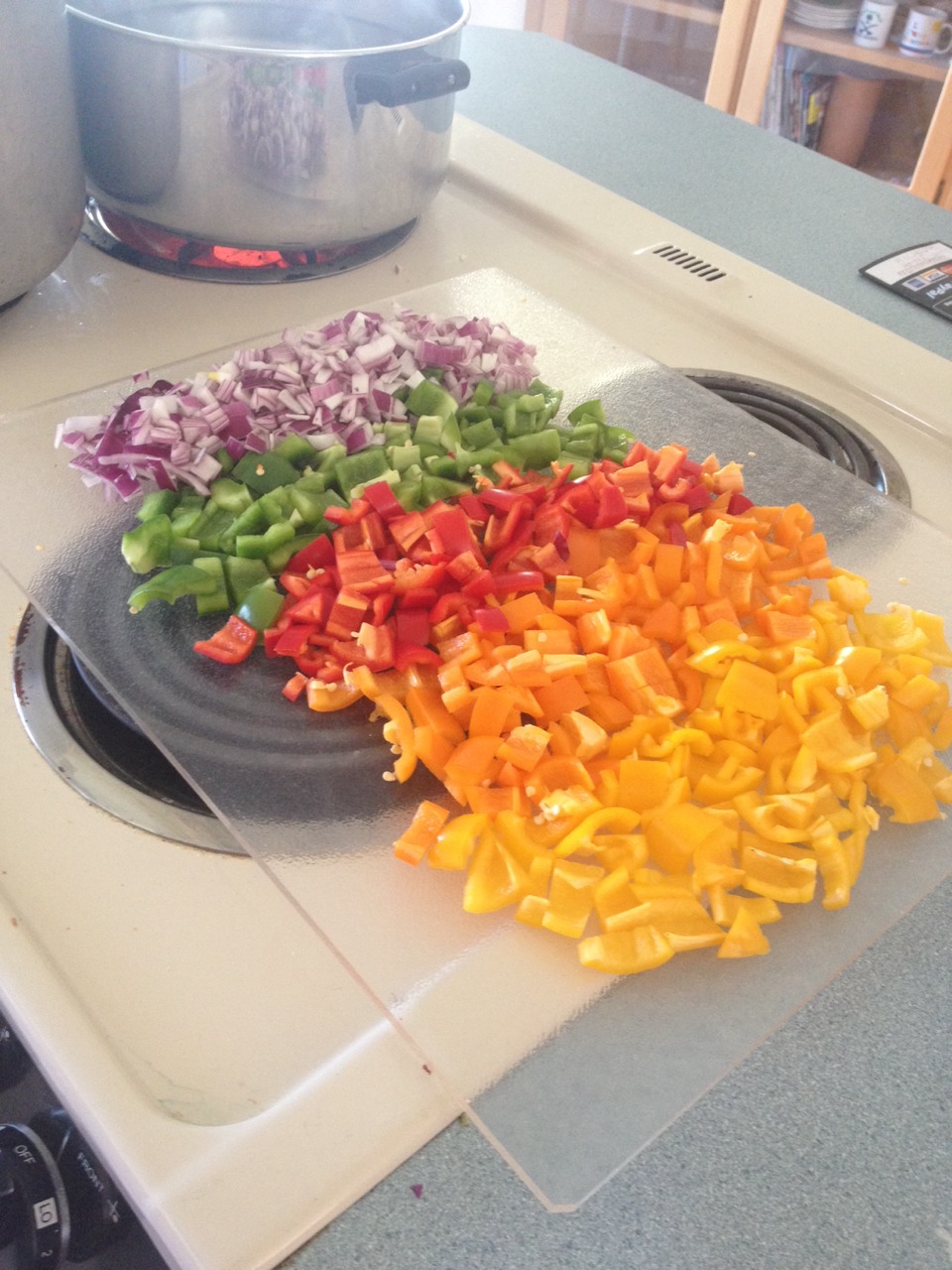 Start with dicing your veggies: 1 cup red onion, green & red bell pepper, orange & yellow hot peppers