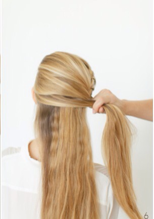 6) Continue taking even sections to add to both sides of the braid, making sure the braid remains located along the hairline.

