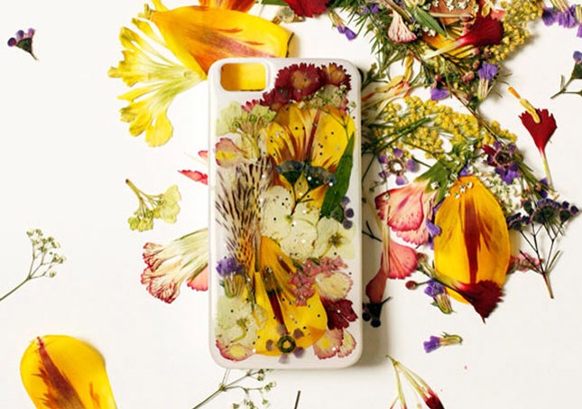 What you do:
Dry  flower and leafs by keeping  the dry flowers and leafs with super glue to a paper( that you already cut and measureD To the size of inside of the clear case. Then by applying a very thin layer of glue stick this paper to the inside of the phone case. And you are done!!!