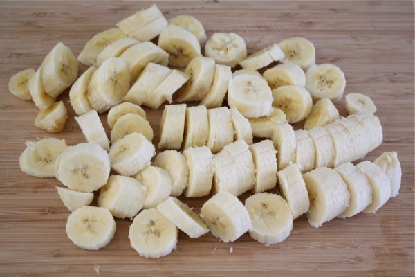 Slice up four ripe bananas and put them on a large plate. Put them in the freezer and let them chill until they are frozen-about two hours.