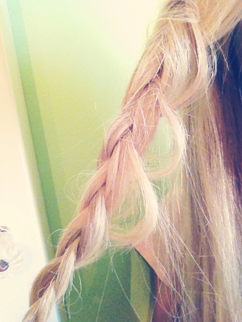 Take smaller parts from the braid and pull them out, creating a cool loop