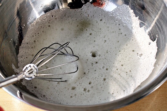 8. In a large bowl, beat the egg whites lightly.