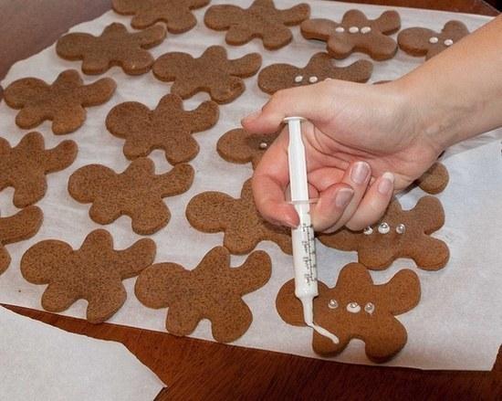 Use a syringe filled with frosting to expertly decorate cookies and cakes.