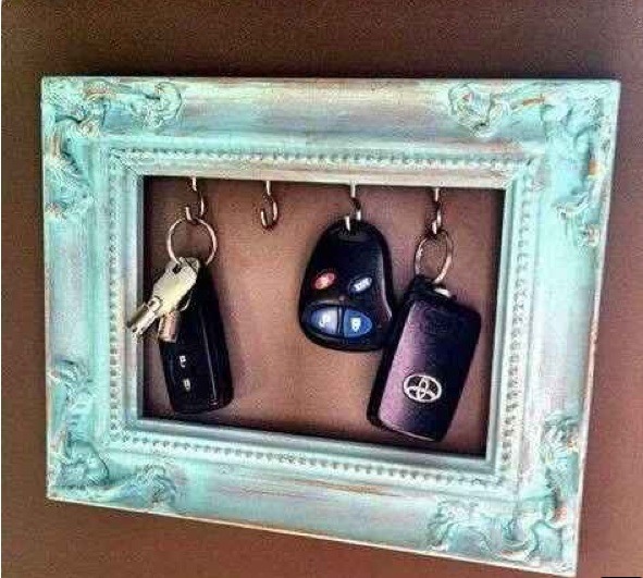DIY Framed key holder
http://www.purplecarrotkc.com/2012/02/diy-frame-key-holder.html
