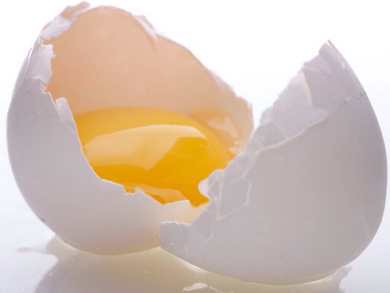 First add an egg yolk to a bowl.