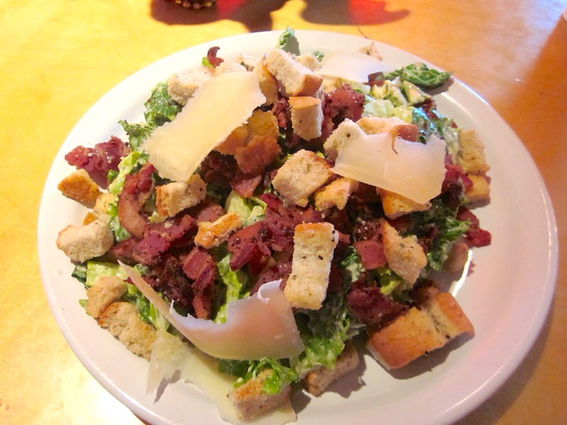 39. Bistro Bacon Salad: Chop and fry bacon; combine the drippings with cider vinegar, dijon mustard, olive oil, salt and pepper. Toss with mesclun greens; top with the bacon and a poached egg.