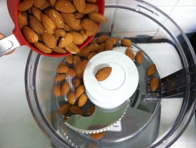 preparing to make almond butter:
add 3 cups of raw almond, pinch of salt (if desired), turn machine on low allowing to run for 10-20 minutes stopping occasionally to scrap sides with spatula