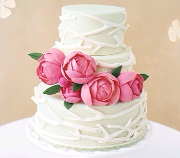 Spring
Perfect peonies made of sugar paste (no, they’re not real) make this one of the best blooming cakes you’ll see. Inside: blackberry buttermilk cake with citrus buttercream. And celadon-tinted fondant adds a subtle hint of color.