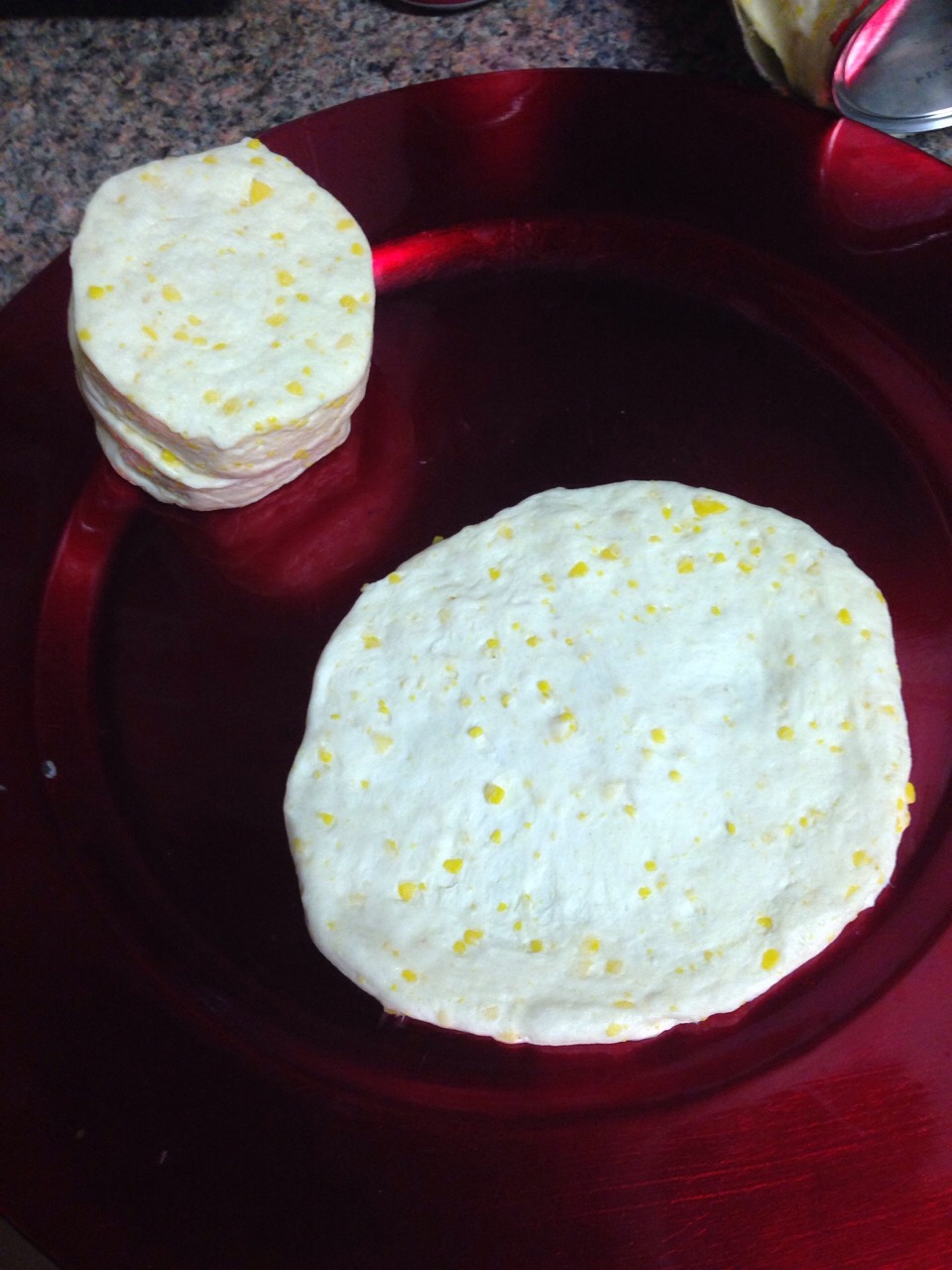 Separate the biscuits and flatten them into circles (works best with buttermilk non flaky biscuits)