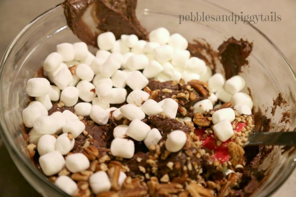 3. Stir in marshmallows--as many as desired as long as they melt (about 2-3 handfuls). The marshmallows must melt so you can put it in the microwave for a few seconds if needed.