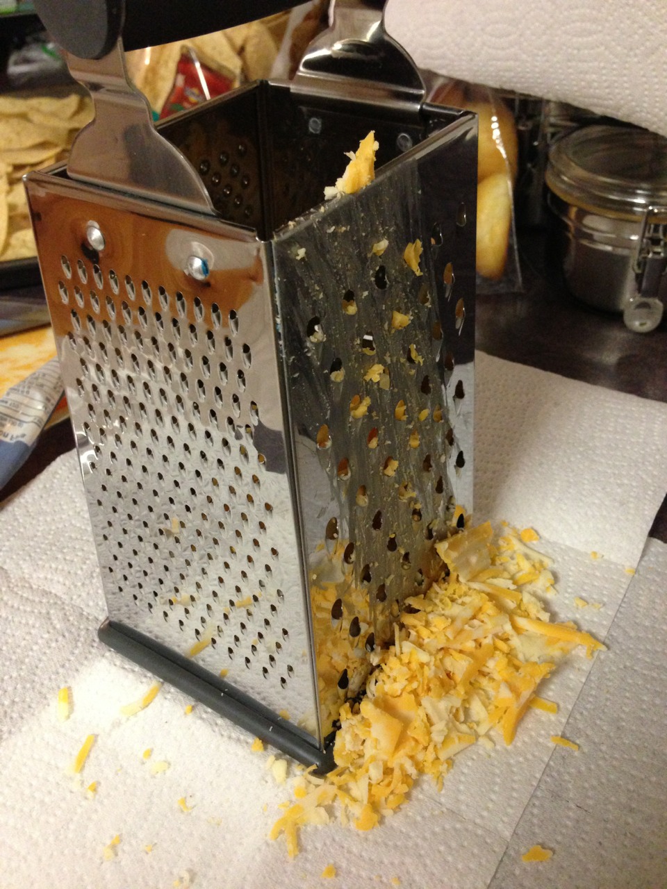Grate cheese