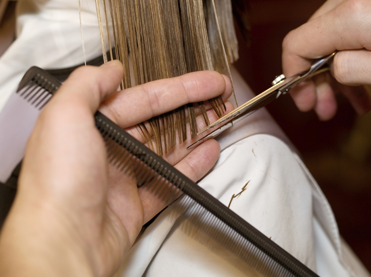 Get your hair cut regularly, it helps reduce the appearance of split ends and reduces weakness and damage.