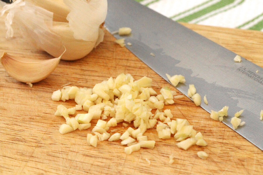Finely chop the garlic, and cut the bell pepper into chunks. Add these to the egg mixture. Garlic is great for your heart and can prevent CHD. 