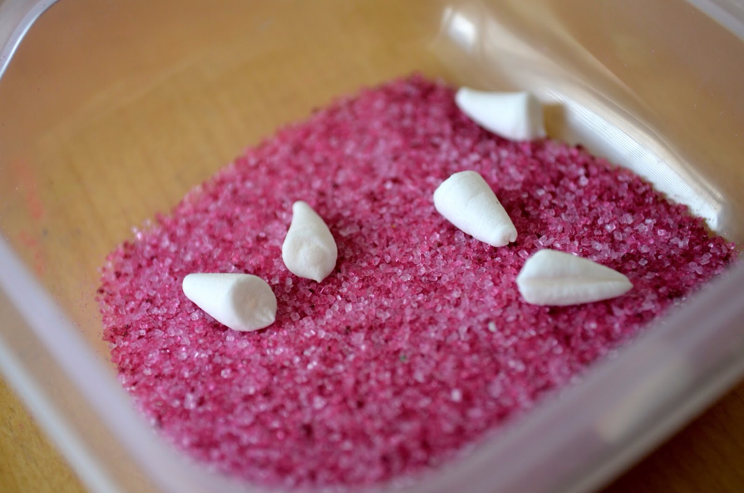 Dip the sticky part in colored sprinkles 
