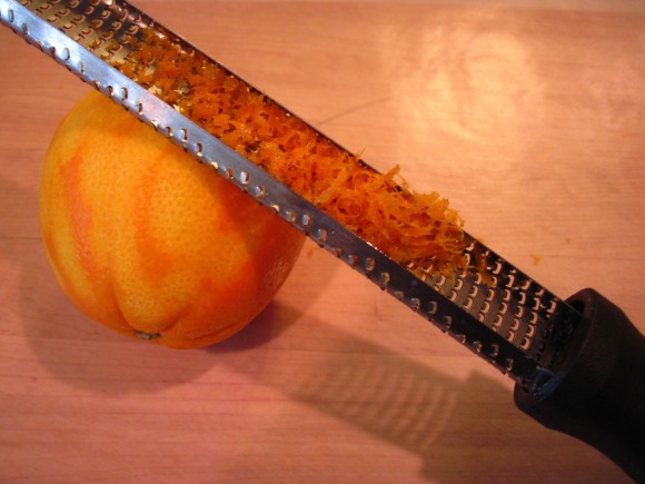 1. Zest the oranges.

Zesting the oranges is quick and easy with a Microplane zester.