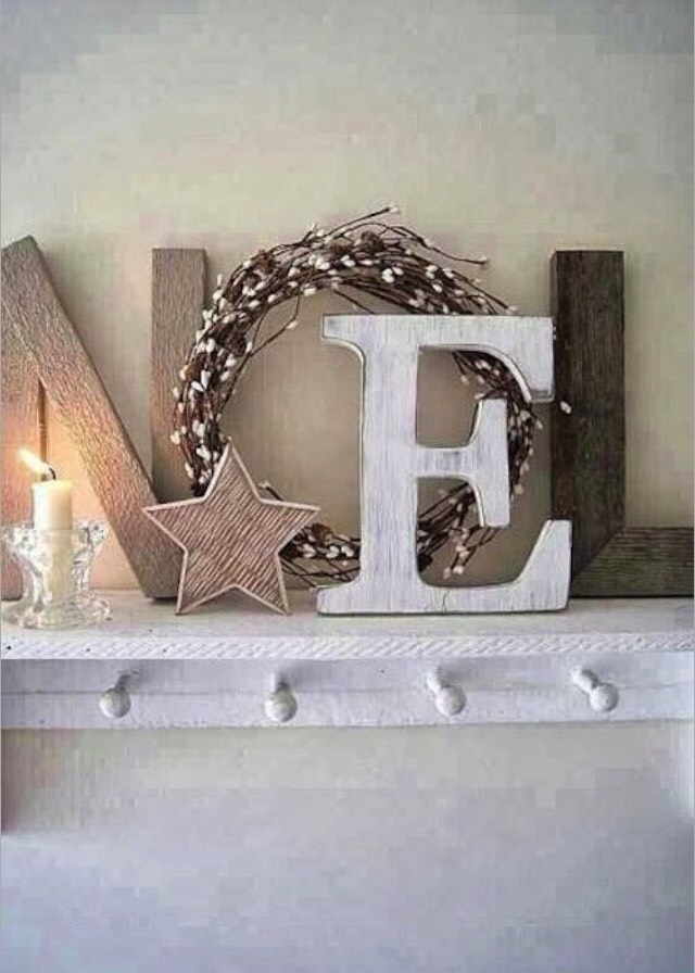 Use wooden letters and a wreath to create this festive sign!