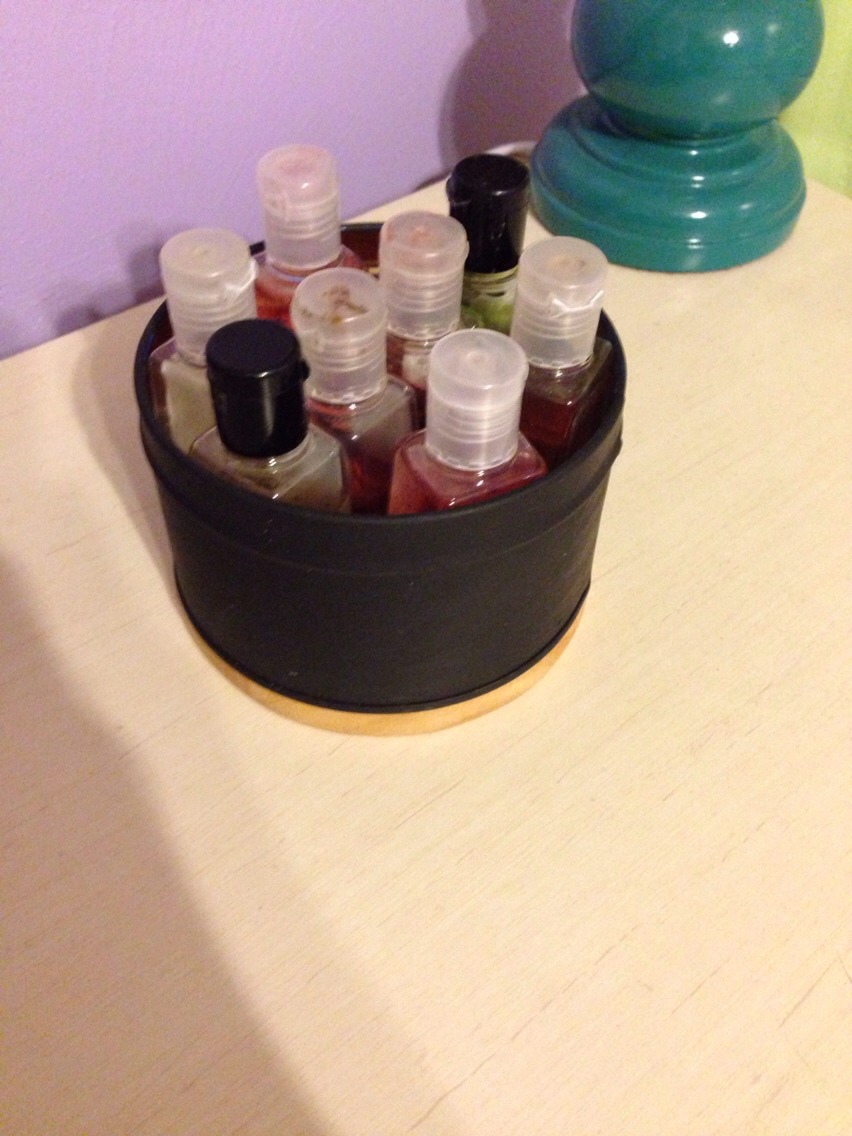 I took a container and painted it black an stuck my bath and body works germ-xs in it