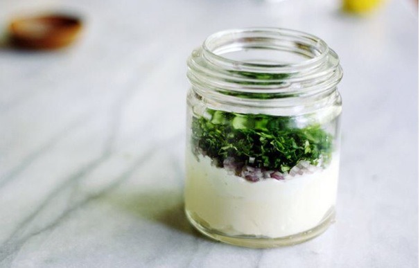 2. We recommend you transform the bit of mayo left in the jar into a tasty and highly useful salad dressing. All you have to do is combine it with fresh herbs, some olive oil and spice, and shake it hard afterward.