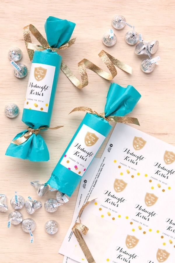 Who doesn’t love chocolate? Many people give out small bags of M&Ms that match the color scheme of the wedding. Others remove the outer packaging from chocolate bars and replace them with custom-made wrappers that detail the date and names of the two getting married.