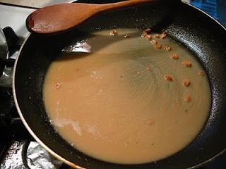 Slowly add about one cup of the liquid mixture directly from the cooking stuffed cabbage to the Zaprashka and blend until smooth. Then, add this mixture back to the cooking stuffed cabbage.