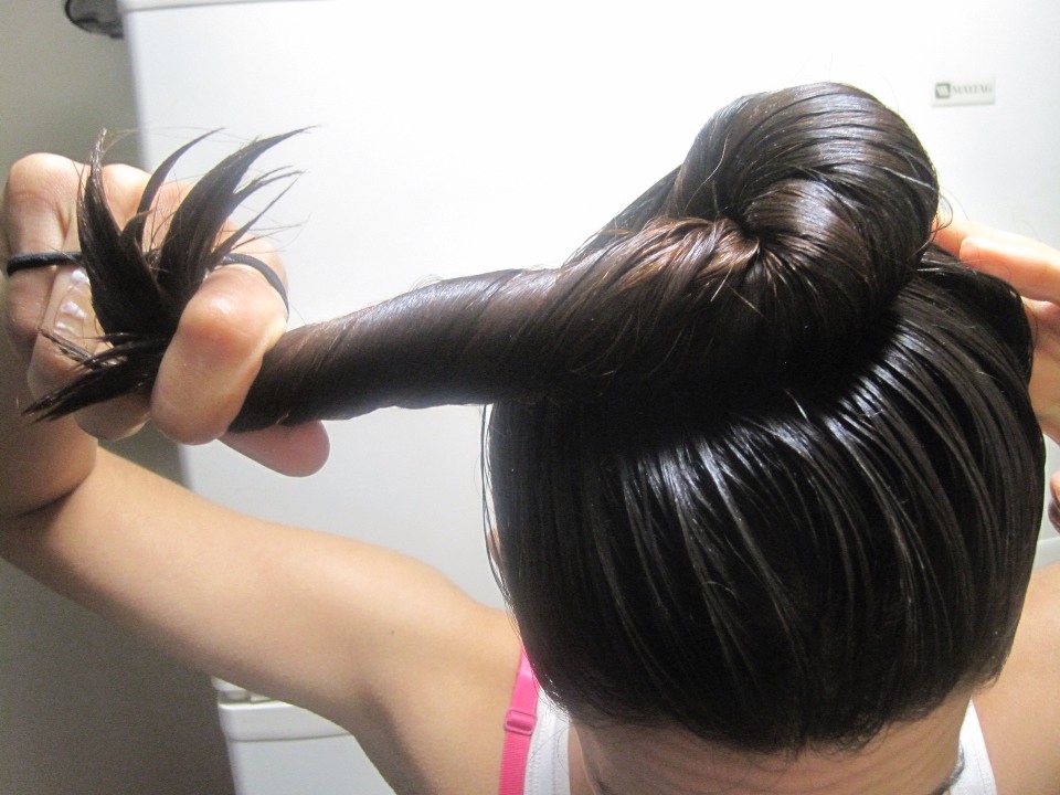 After you applied the coconut oil on your hair completly you make it into a bun or a pony tail i personally do bun .