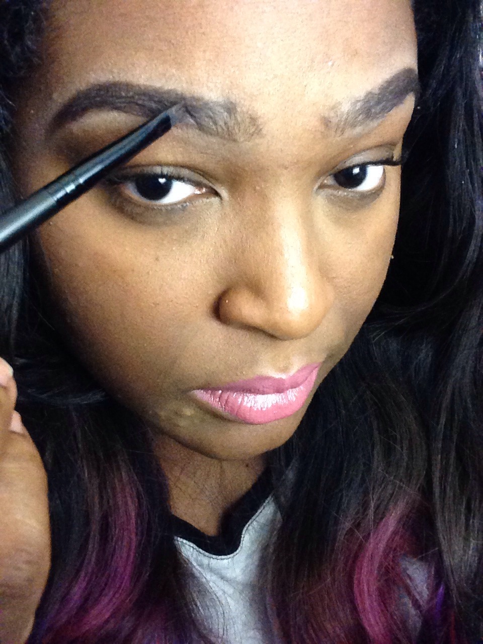 Use your liner brush to fill in your brows with the cream gel(from your brow kit), to darken hairs. Make sure to begin at the mid center( shown above) to ensure no boxy super square brows( which are a NO NO). We want to keep them NATURAL looking.