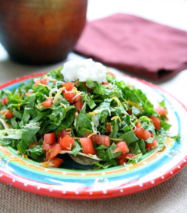 Lightened-Up Taco Salad

Taco salad is just the best, but it can be really heavy and full of fatty foods and toppings. This version cuts down on the fat but still keeps the amazing flavor and texture we all love. It's win-win!