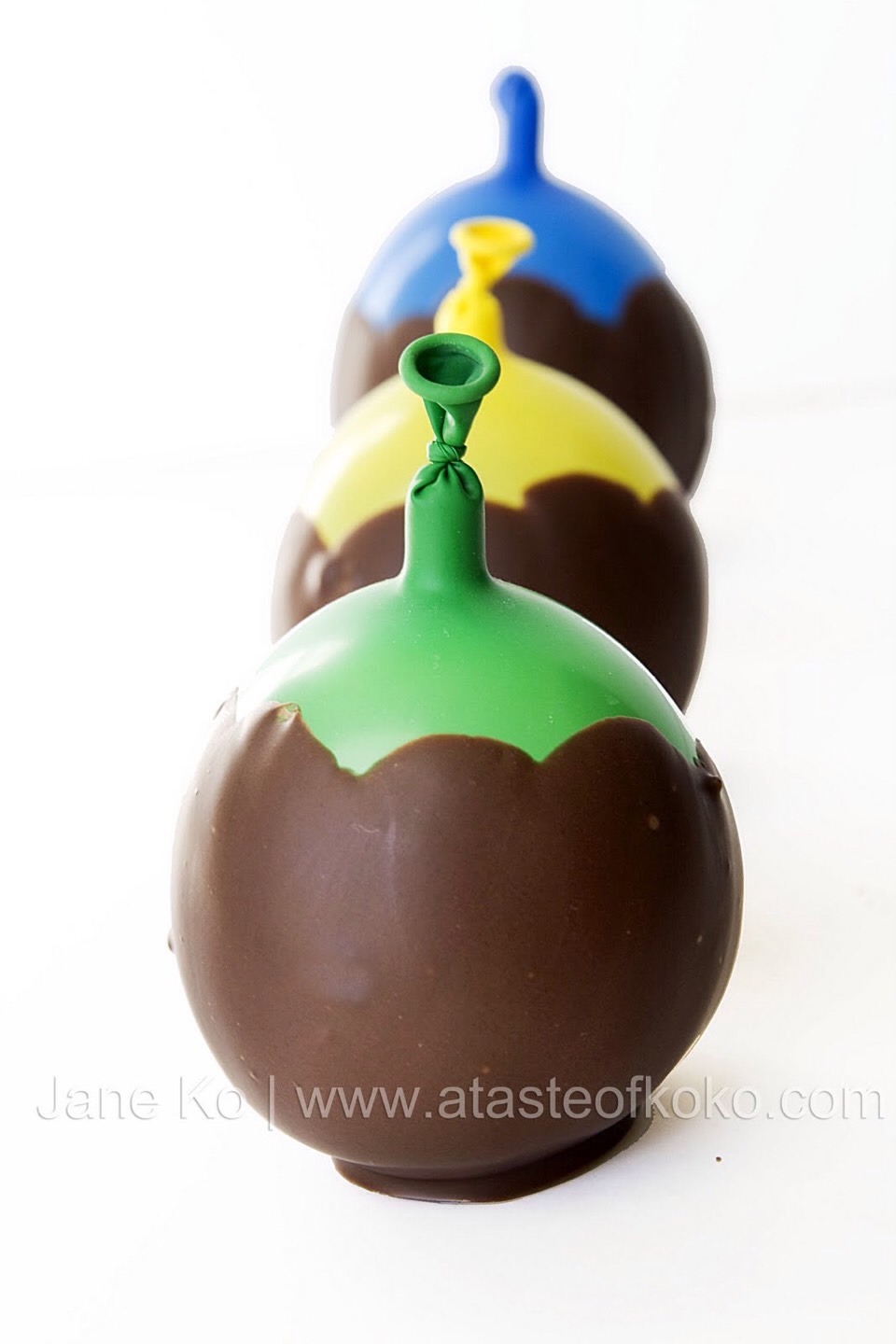 Have liquid warm chocolate then dunk a blown up water ballon.
