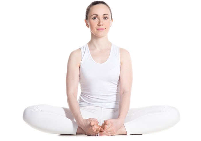 4. Baddha Konasana/Bound Angle Pose
Baddha Konasana, also known as the Cobbler’s Pose, is one of the simplest asanas of all time and is extremely beneficial. Its main impact is on the lower body, which is why it should be a part of your yoga regimen.
