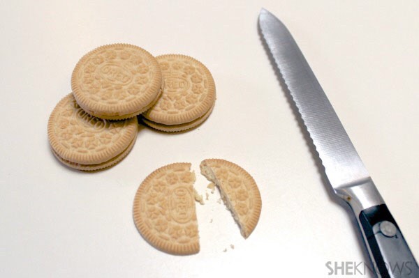 To Assemble the Taco Shells:
• Remove the top and bottom wafers of the Golden Oreo cookies and scrape off the filling. • Using a sawing motion with a serrated knife, carefully cut each Oreo wafer just above the Oreo logo (about 2/3).
*be careful and try your best to make each side symmetrical* (: