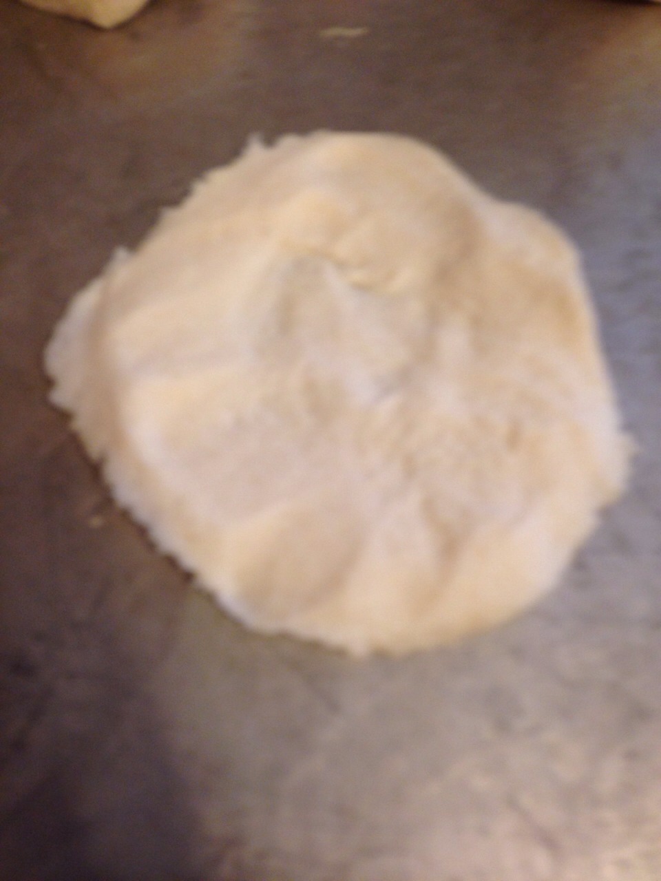 Squish out the dough into a circle 