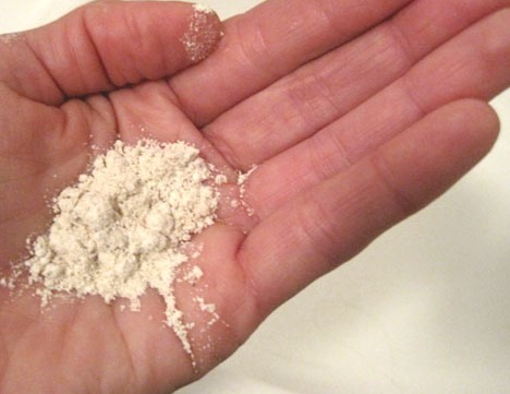 Steps for washing:
Get a small amount of baking powder, add some water until it turns into a paste. 
Apply it on the wet face rubbing it in circles for about 15 seconds.
Rinse with lukewarm water
Try this every night and see the difference 