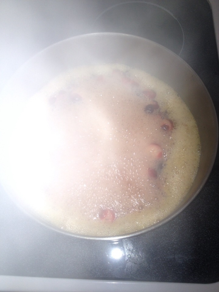 The foam will start to turn pink, this means your cranberries have all popped.