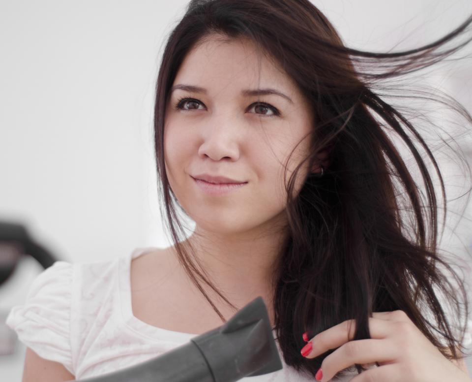 spray your roots with dry shampoo before you start producing oil. This way the dry shampoo will absorb any moisture before it weighs down your tresses. Also make sure you protect your hair from moisture (rain is sure to ruin your mane) and touch up your blow out in the morning using a hair dryer