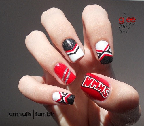 This nail design would be perfect for cheer team with the colors of red,black,and white