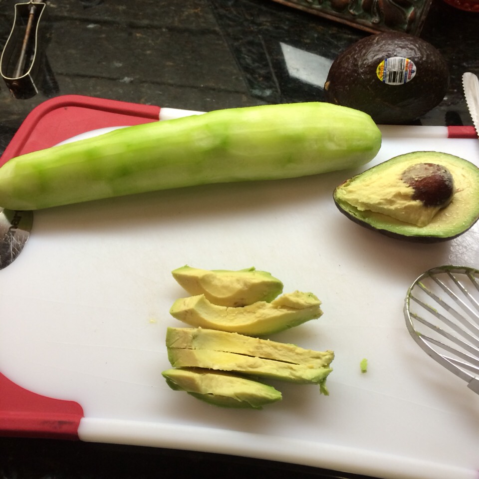 Peel the cucumbers skin off. Do the same to the avocado.
