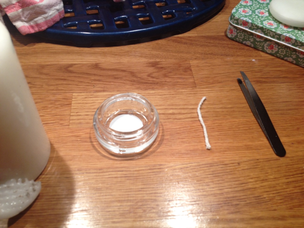 An empty jar and a piece of string (abit longer then the jar) 