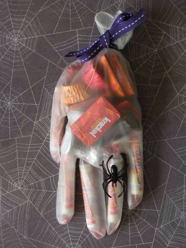 Use " new" plastic gloves and add some candy and decorate :)