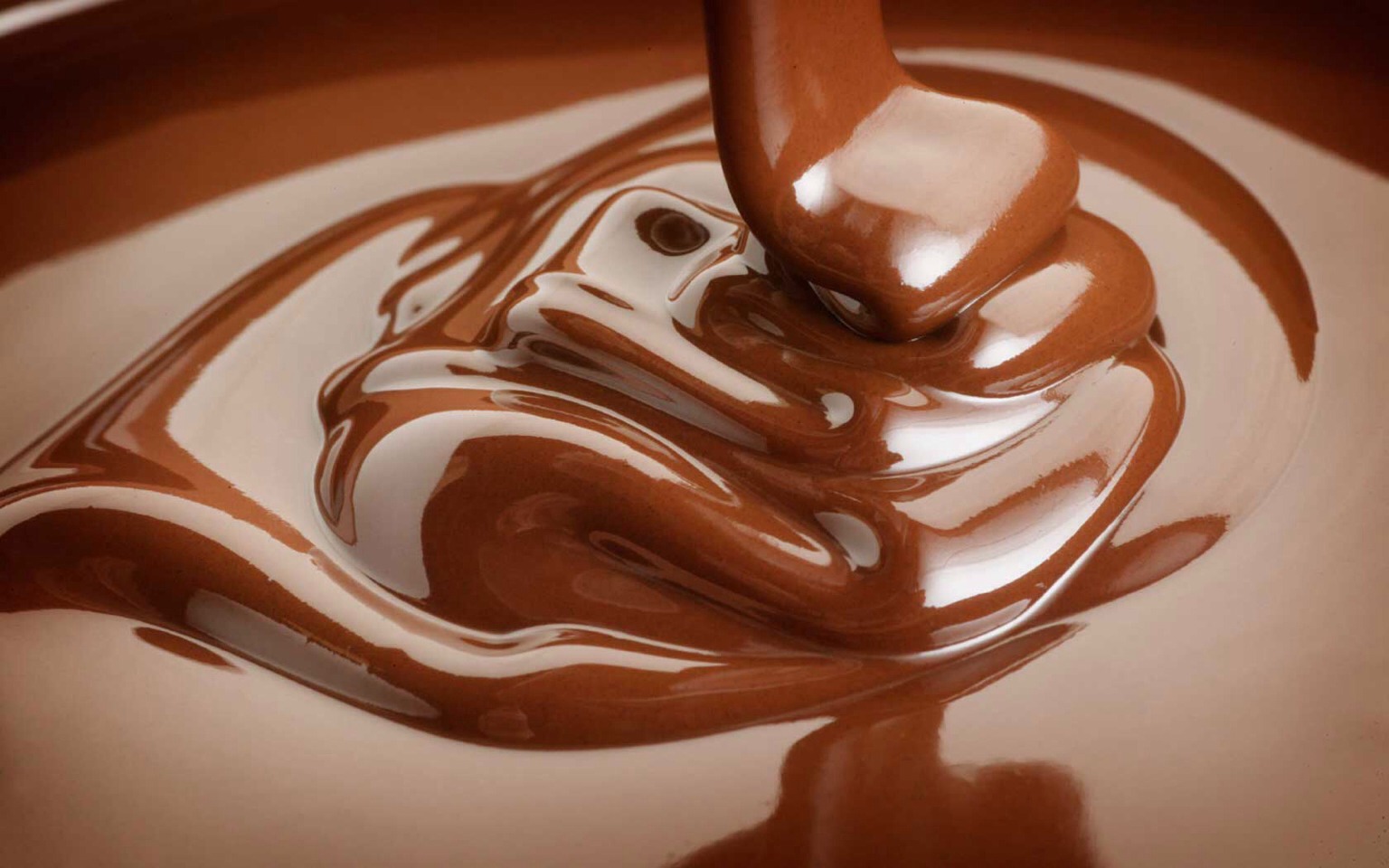 Scrape your homemade nutella into a jar or other resealable container and let it cool to room temperature. Cover the container after snitching several spoonfuls. The nutella will keep on the counter for up to 2 weeks. (Hah!)